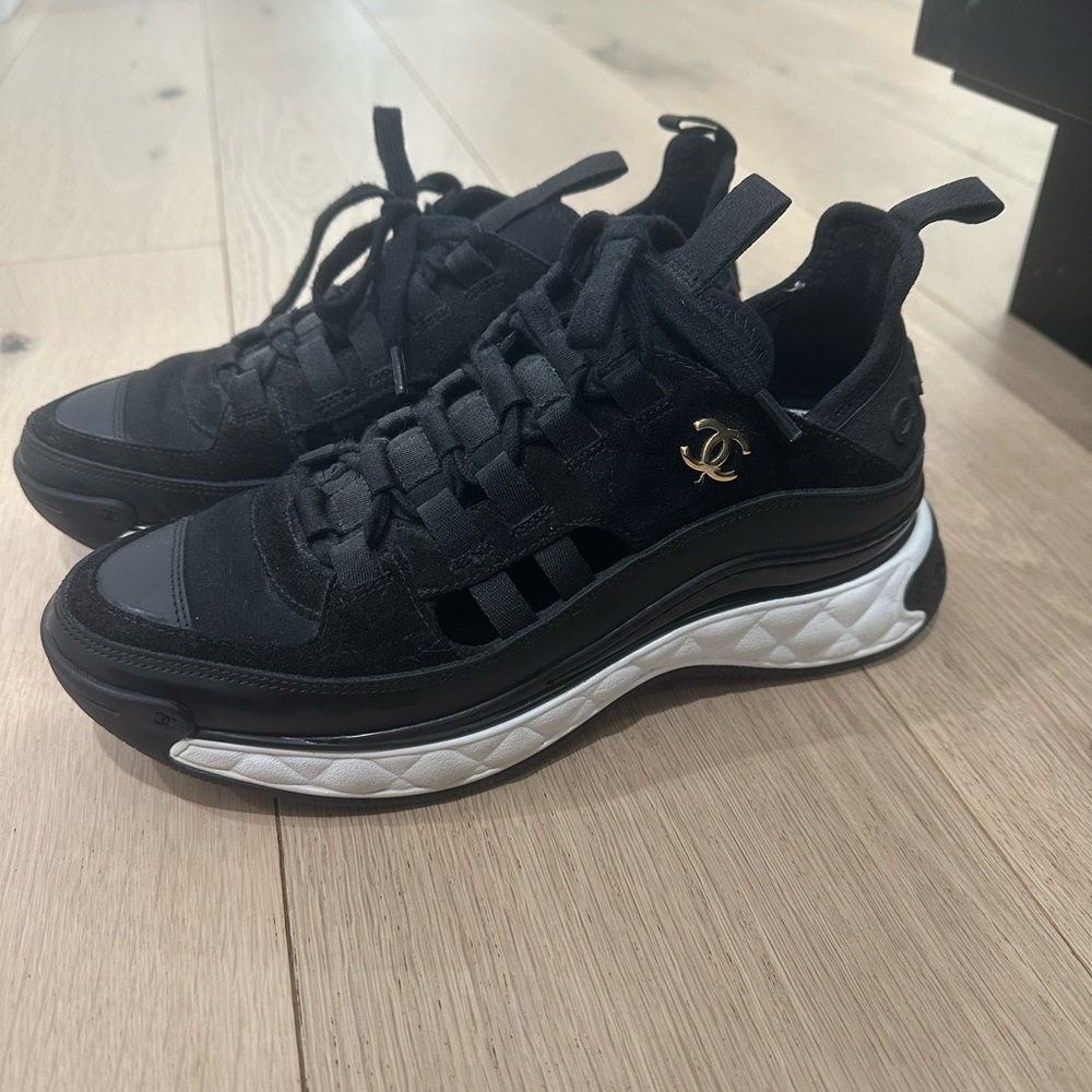 CHANEL Black Sneakers with Gold Logo and White Soles